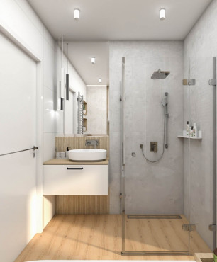 Łazienka z prysznicem i szarym grzejnikiem zamontowanym na ścianie