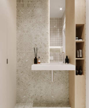Mała łazienka z imitacją betonowych płytek na ścianie i podłodze