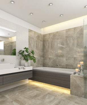 Szara, marmurowa łazienka z podświetlaną  wanną