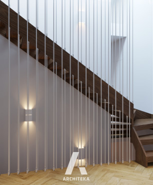 Drewniane schody w białym korytarzu
