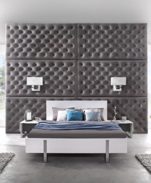 Nowoczesne meble w sypialni z tapicerowaną, pikowaną ścianą