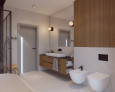 Łazienka z dużymi białymi kaflami na podłodze i na ścianie oraz z drewnianą szafką pod białym zlewem