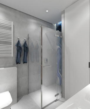 Łazienka z prysznicem z drzwiami odchylnymi i z białą szafą
