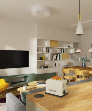 Projekt salonu z żółtym fotelem uszak połączonego z jadalnią i kuchnią