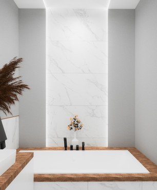 Projekt łazienki z białym gresem na ścianie oraz z wanną w zabudowie