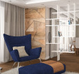 Projekt salonu z jedną ścianą ozdobioną drewnem oraz z granatowym fotelem