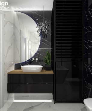 Nowoczesna łazienka z gresowymi płytkami w kolorze biało-czarnym
