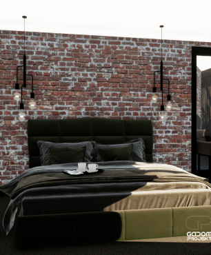 Sypialnia z ciemnozielonym, tapicerowanym łóżkiem