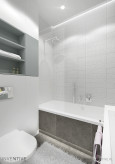 Biała łazienka z prysznicem i wanną